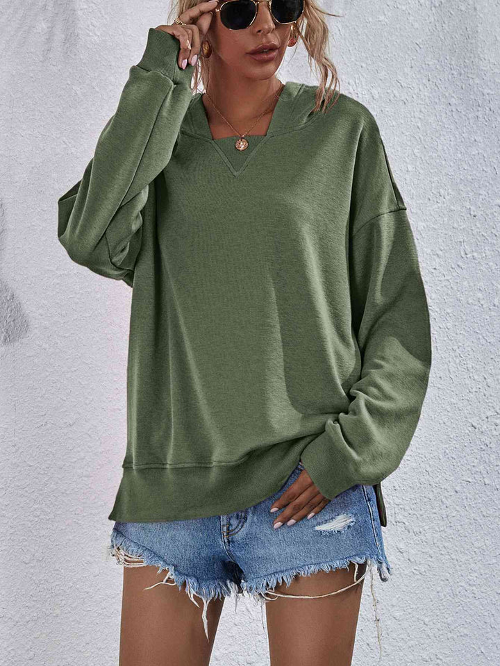 Dropped Shoulder Slit Hoodie Trendsi