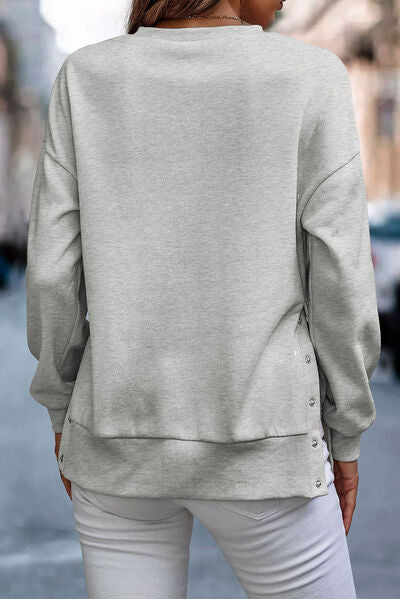 Snap Detail Round Neck Dropped Shoulder Sweatshirt Trendsi