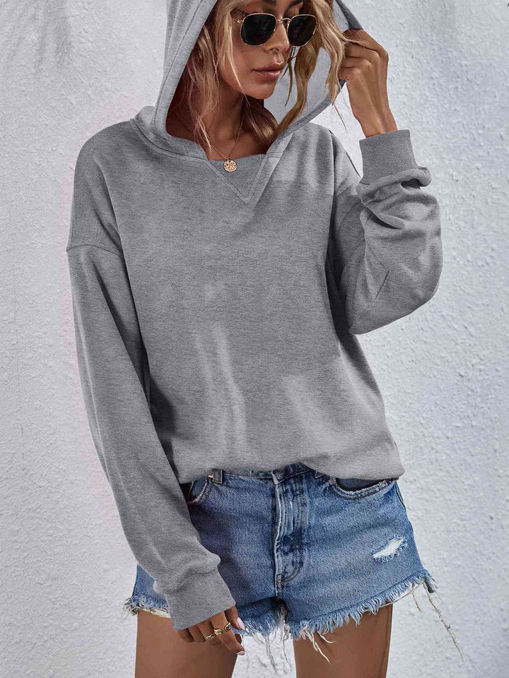 Dropped Shoulder Slit Hoodie Trendsi